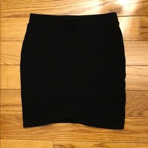 Black body con skirt with front “flap”